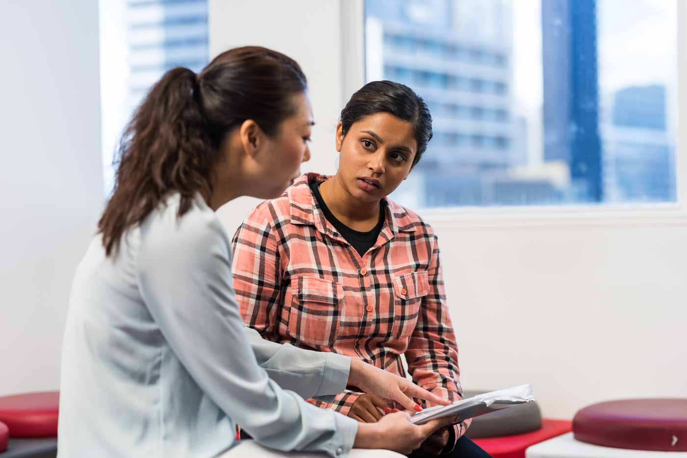 two ladies in discussion