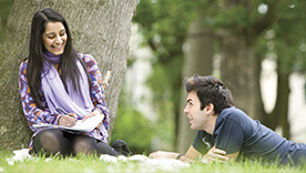 Students chatting on the grass